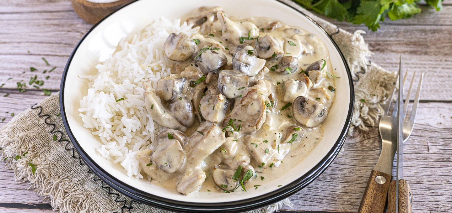 Schweinegeschnetzeltes in Rahmsauce mit Champignons und Reis